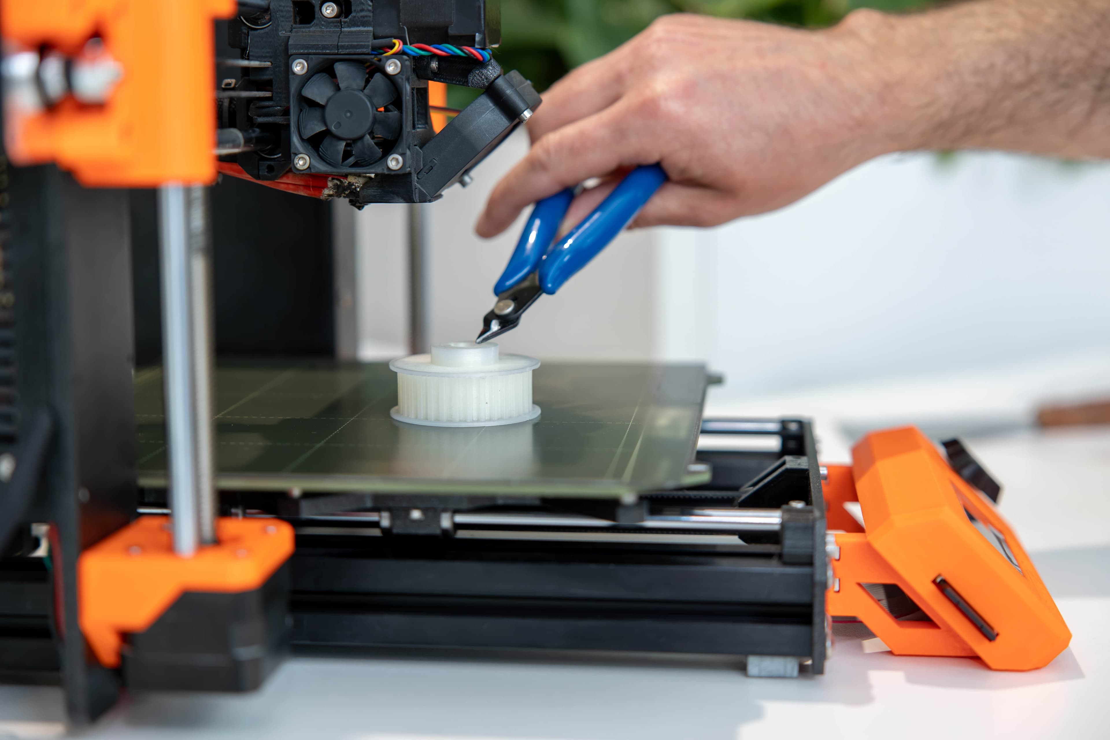 AK Innovations husband and wife team working together in their 3D printing studio