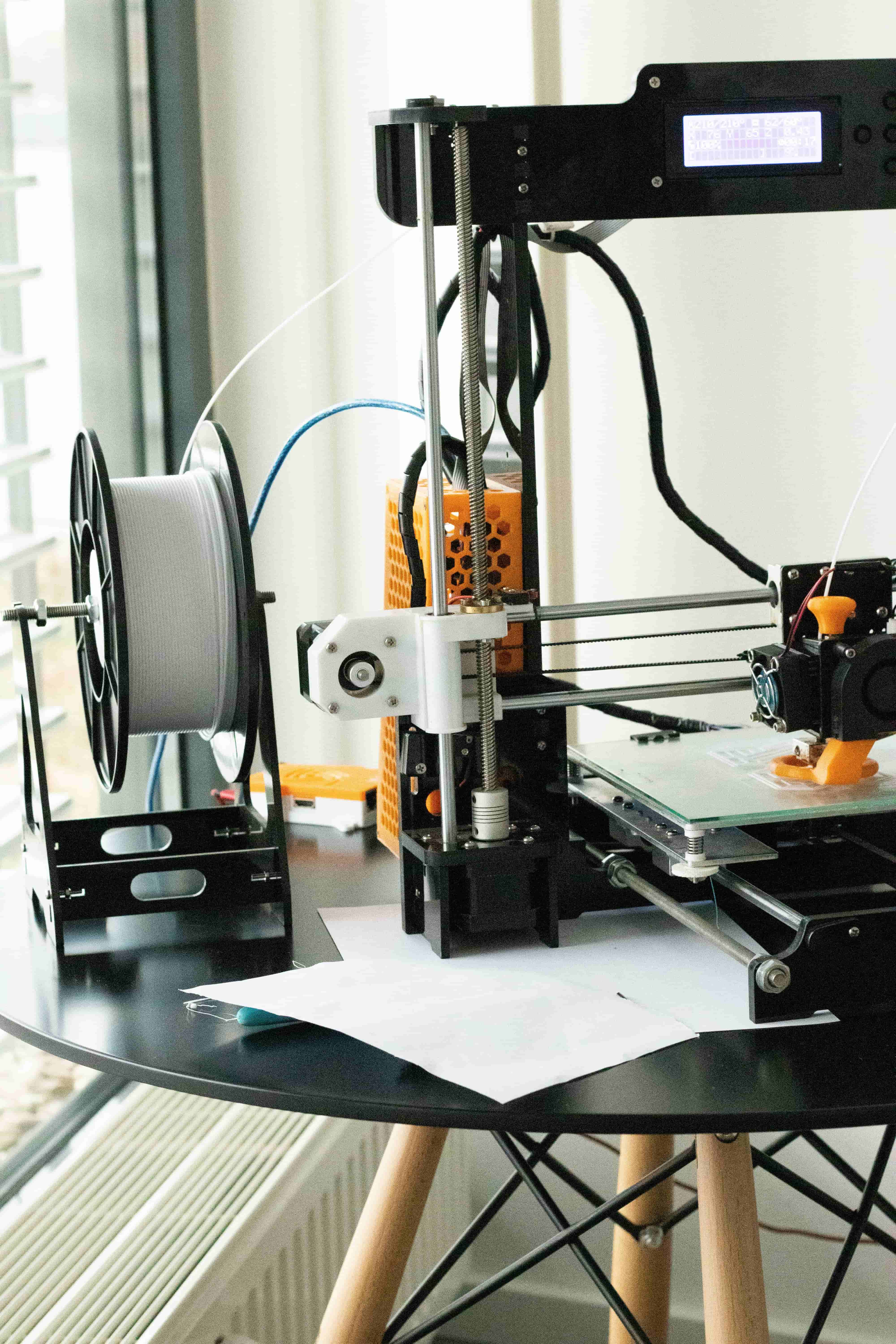 AK Innovations 3D printing studio with professional equipment and workspace